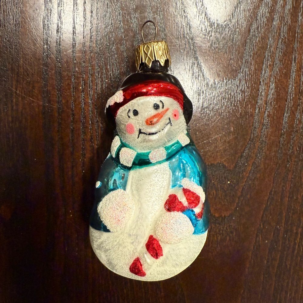 Festive Snowman Ornament with Red and Blue Accents